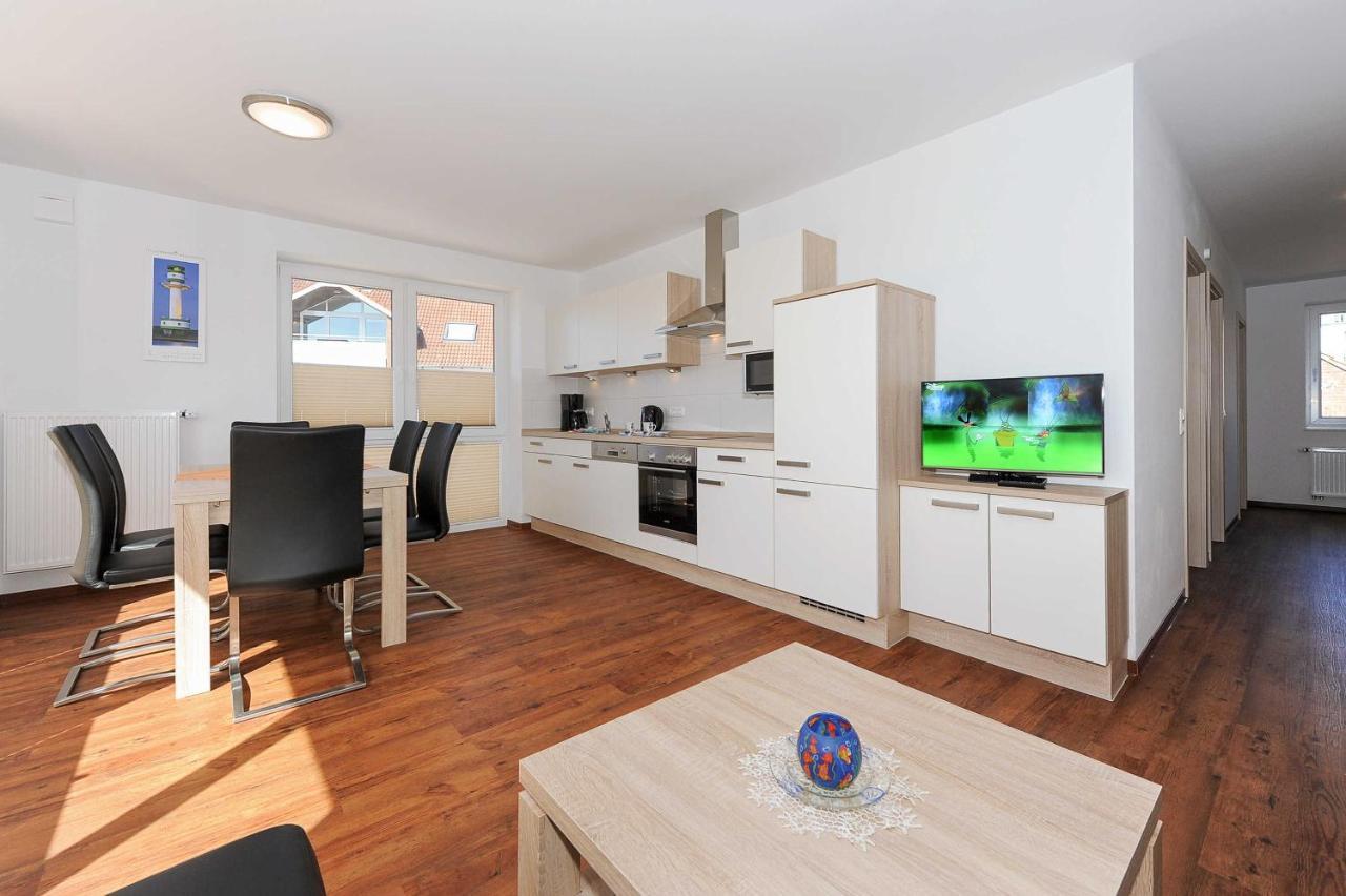 Haus Leuchtturm Apartment Bensersiel Bagian luar foto