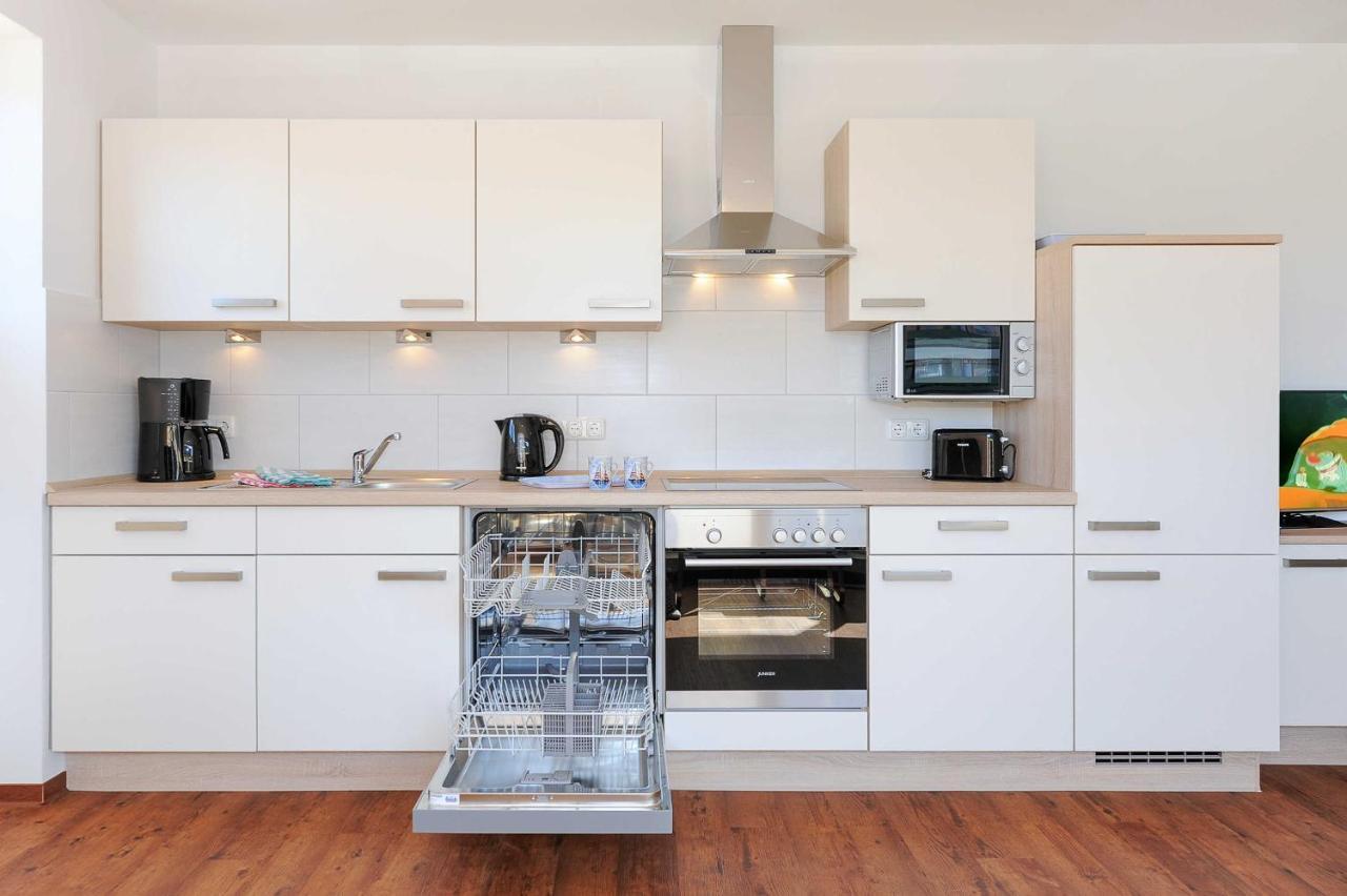 Haus Leuchtturm Apartment Bensersiel Bagian luar foto
