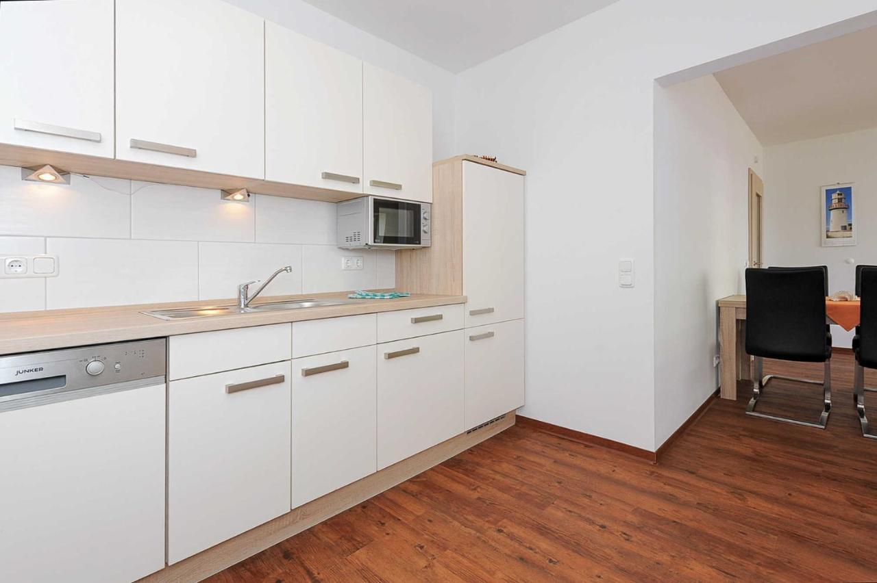 Haus Leuchtturm Apartment Bensersiel Bagian luar foto