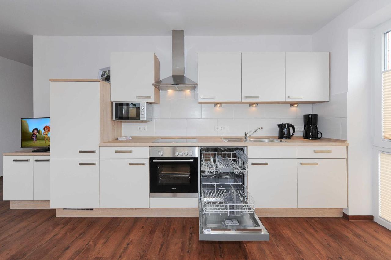 Haus Leuchtturm Apartment Bensersiel Bagian luar foto