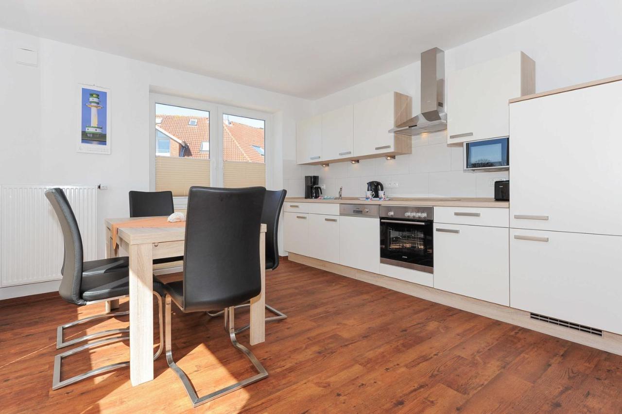 Haus Leuchtturm Apartment Bensersiel Bagian luar foto