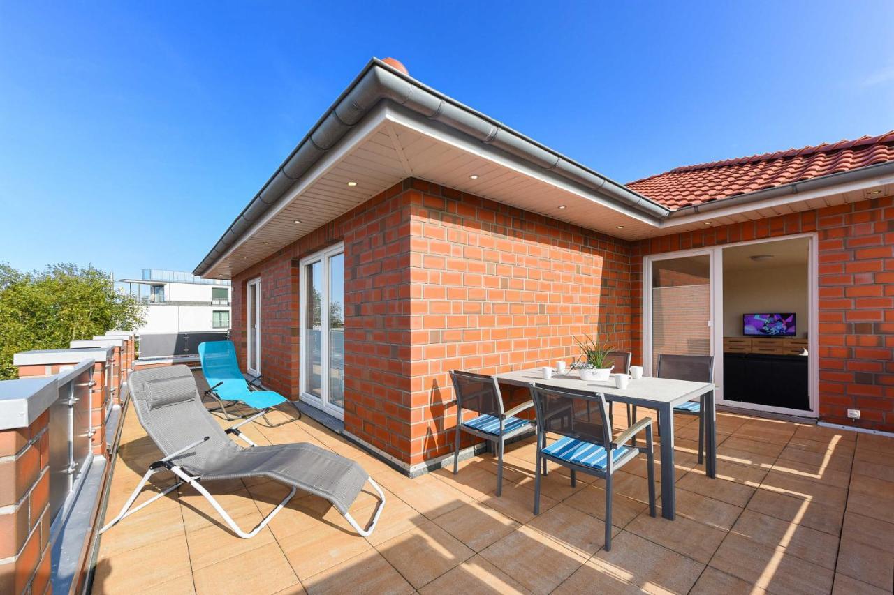 Haus Leuchtturm Apartment Bensersiel Bagian luar foto