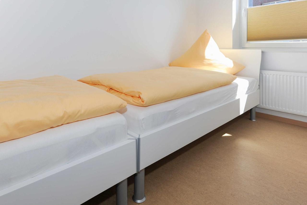 Haus Leuchtturm Apartment Bensersiel Bagian luar foto