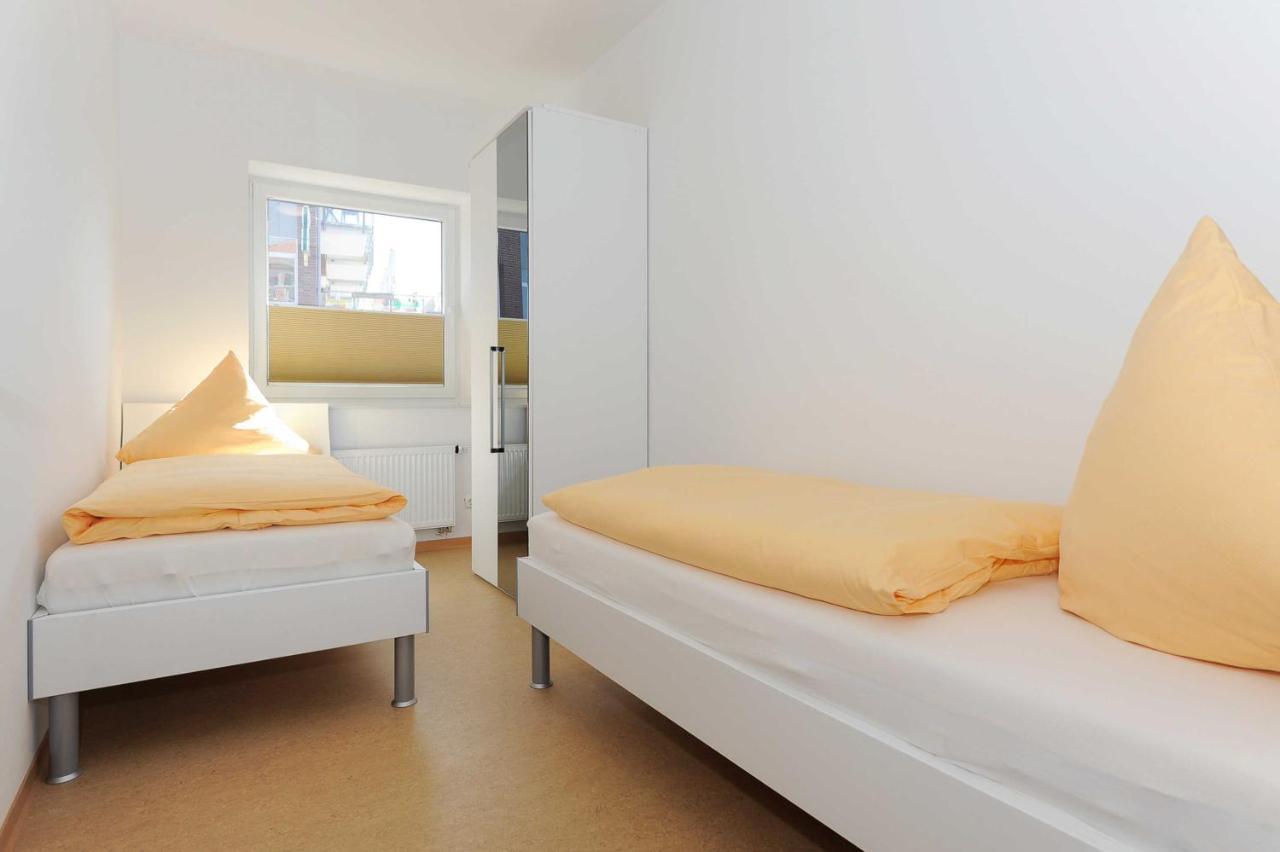 Haus Leuchtturm Apartment Bensersiel Bagian luar foto